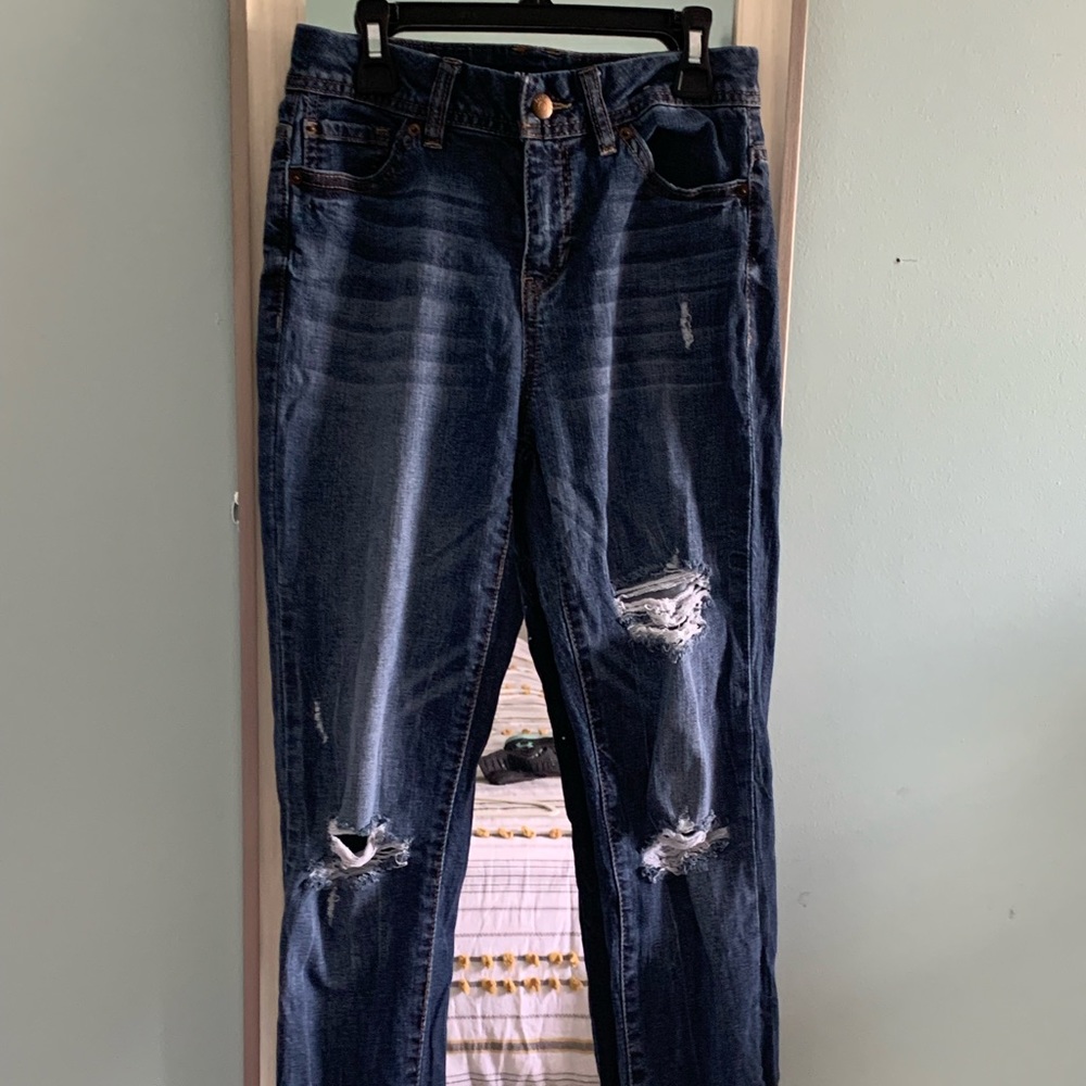 Dark blue ripped jeans